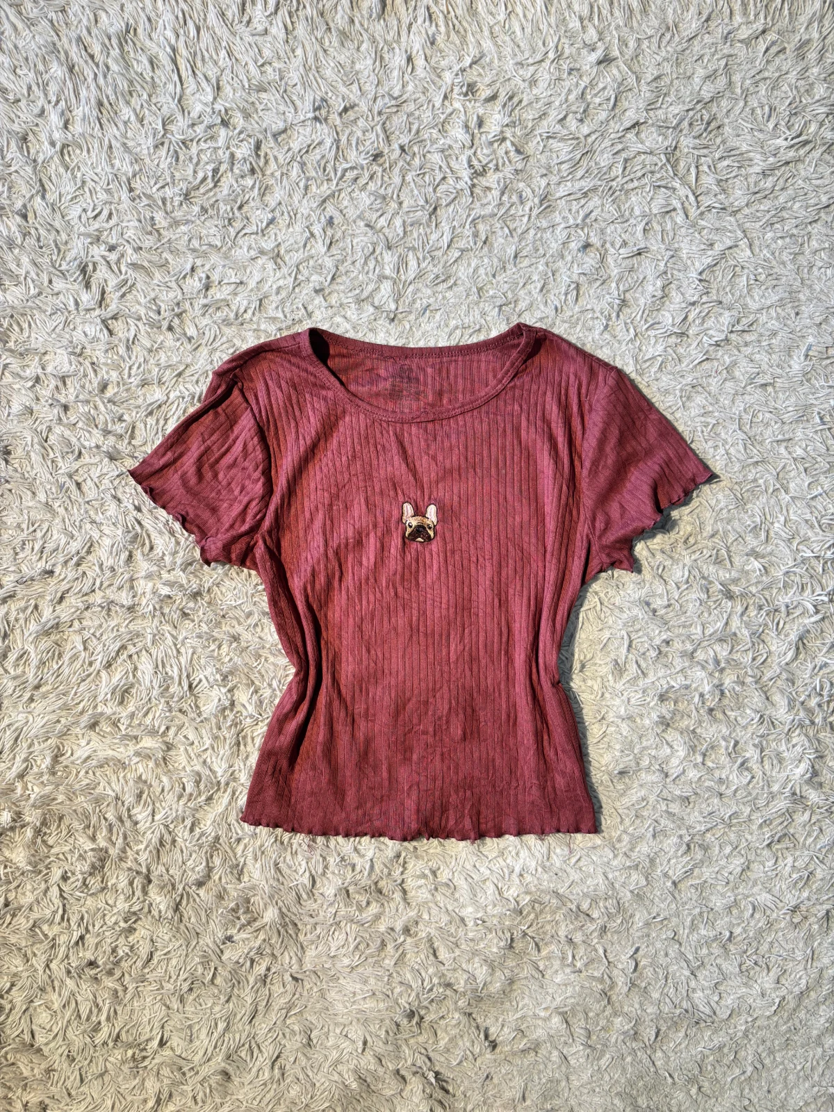 maroon ribbed top features a small, embroidered French bulldog graphic.